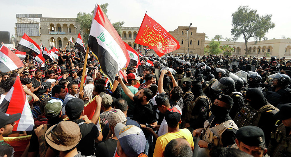伊拉克安全部队与示威民众发生冲突致40人受伤
